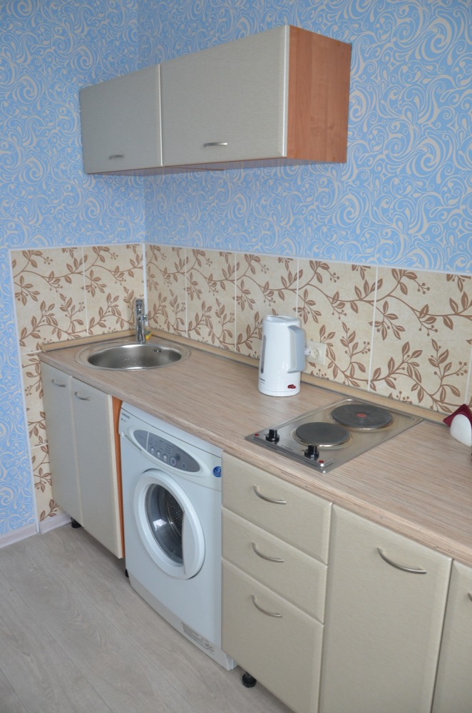 Квартира гостиница в Тольятти с кухонной зоной в номере